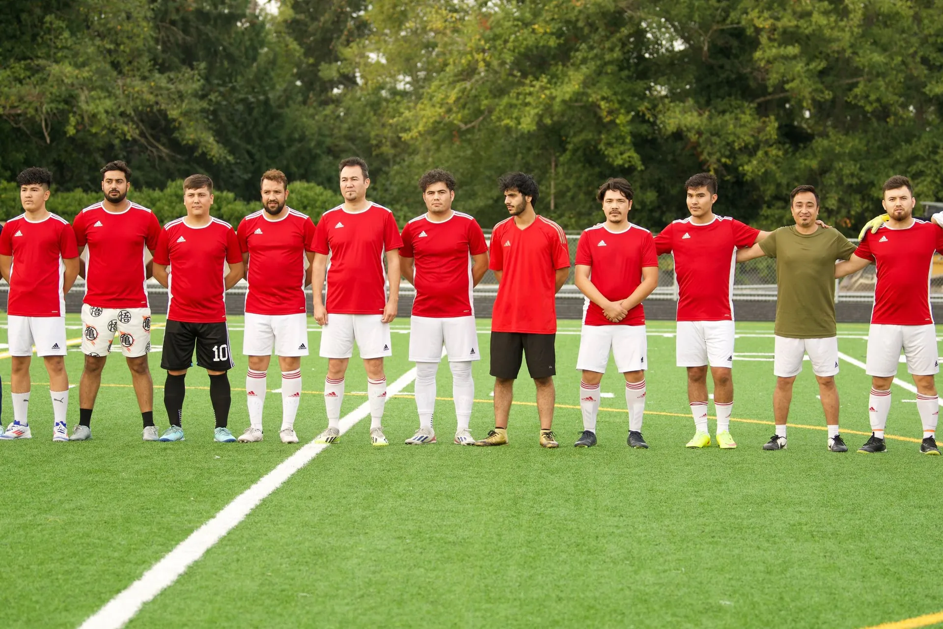 HCO soccer team lined up before a match