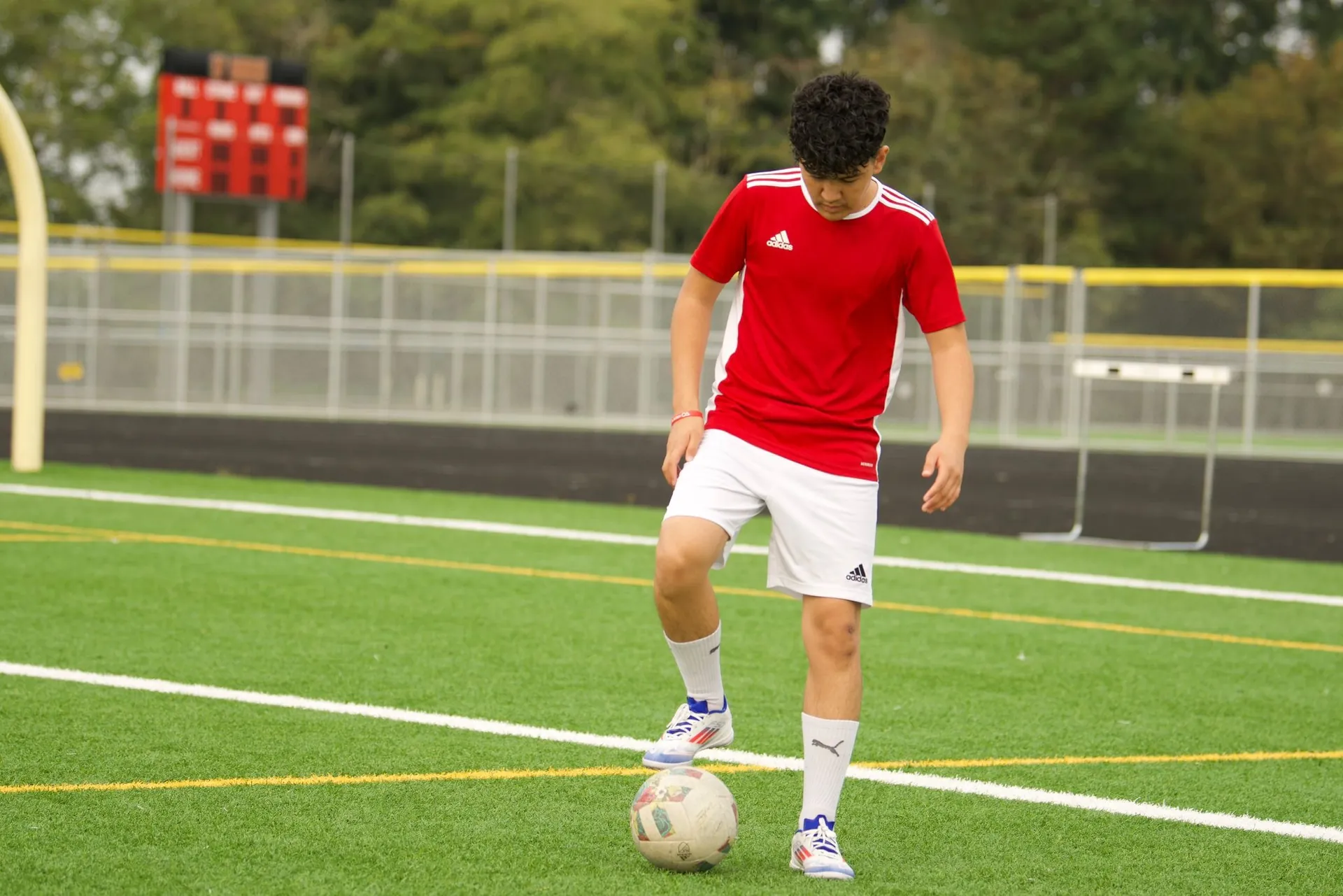 Young athlete dribbling the ball